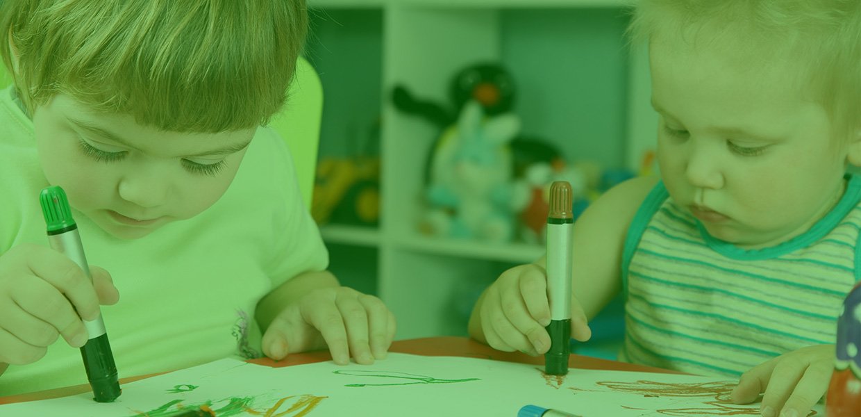 kids drawing with crayons